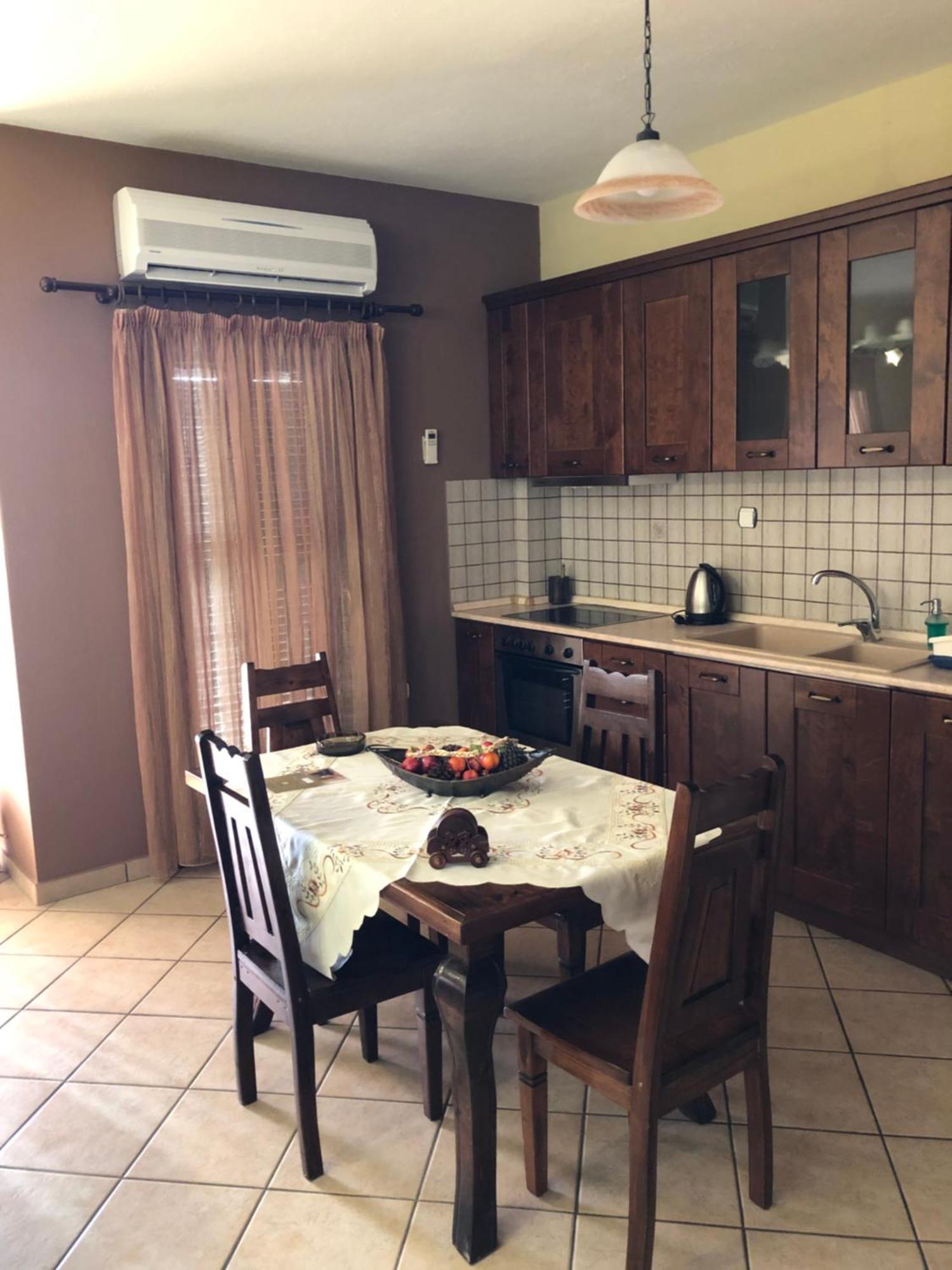 אואוראנואופולי Dione Apartments מראה חיצוני תמונה